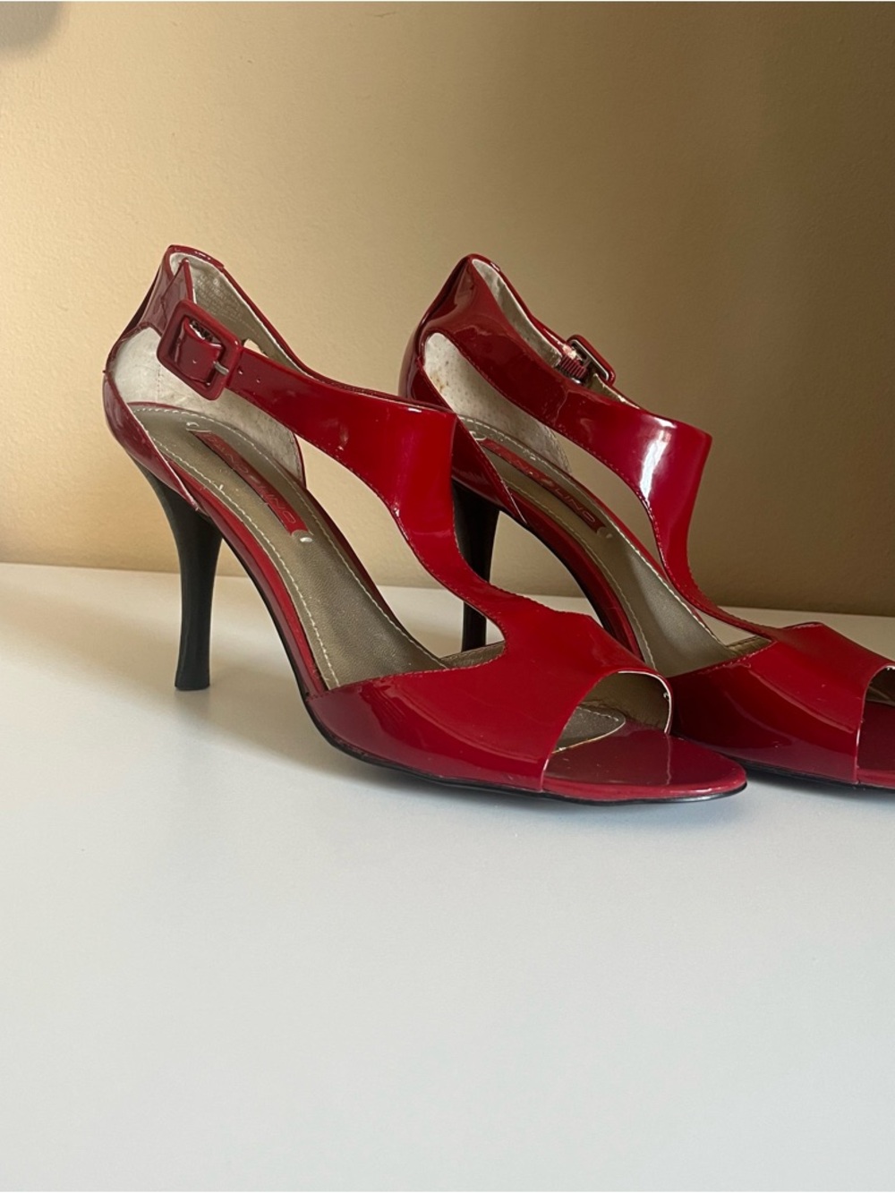 Red Bandolino patent leather peep toe heels with ankle strap, size 9.5